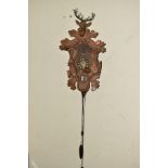 A 20TH CENTURY BLACK FOREST CUCKOO CLOCK, Stag's head pediment 1008, plastic dial with Roman