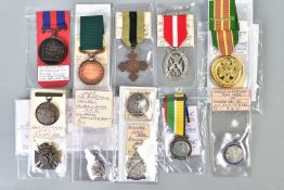 ELEVEN ASSORTED MILITARY SHOOTING MEDALS named to various recipients with in some cases notes of