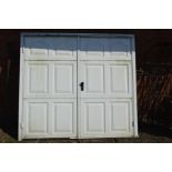 A HINGED DOOR GARAGE DOOR, width 223cm x height 224cm