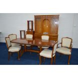 A REPRODUCTION YEW WOOD DINING/LOUNGE SUITE, comprising an extending draw leaf table with one