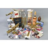 A COLLECTION OF MILITARY INTEREST ITEMS to include brass models of a Lancaster bomber and