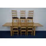 A MODERN BEECH REFECTORY TABLE with two additional leaves on four chamfered legs united by a