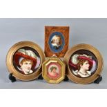 FOUR LATE 19TH/EARLY 20TH CENTURY FRAMED PORCELAIN PLAQUES, three of beauties including a pair and