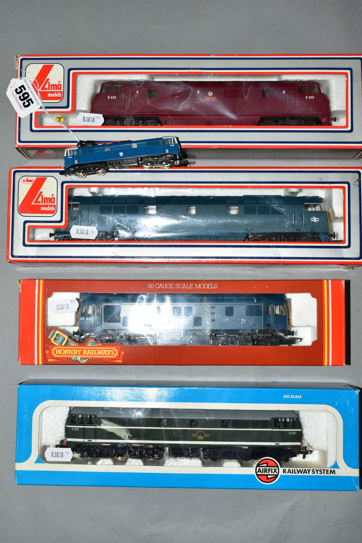 FIVE BOXED AND UNBOXED OO AND N GAUGE LOCOMOTIVES, comprising boxed Hornby OO gauge Class 25