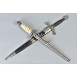 TWO WWII ERA GERMAN 3RD REICH DAGGERS to include a 2nd model Luftwaffe dagger, grip, pommel etc