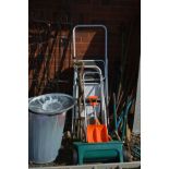 A QUANTITY OF VINTAGE GARDEN TOOLS together with two step ladders and a galvanised bin