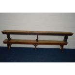 TWO EARLY 20TH CENTURY PINE BENCHES, longest length 290cm