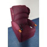 A HSL RED UPHOLSTERED ELECTRIC RISE AND RECLINE ARM CHAIR