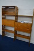 A STAPLES TEAK TWO SECTION MODULAR ROOM DIVIDER/WALL SHELVING SYSTEM, comprising three laddered