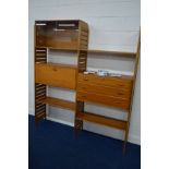 A STAPLES TEAK TWO SECTION MODULAR ROOM DIVIDER/WALL SHELVING SYSTEM, comprising three laddered