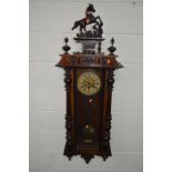 A LATE 19TH CENTURY MAHOGANY AND WALNUT VIENNA REGULATOR WALL CLOCK, with a ceramic horse