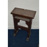 AN EARLY 20TH CENTURY OAK CHURCH READING STAND with carved lettering to side supports, width 61cm