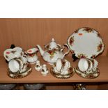 A ROYAL ALBERT OLD COUNTRY ROSES PART TEA SET AND ACCESSORIES, comprising tea pot, milk jug, five