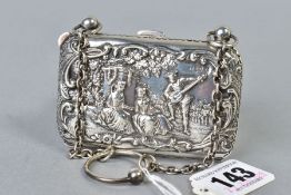 AN EDWARDIAN SILVER PURSE OF RECTANGULAR FORM, repousse decorated with a fete champetre and a