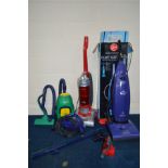 A HOOVER 2200 WATT UPRIGHT VACUUM CLEANER together with another Hoover vacuum cleaner and two