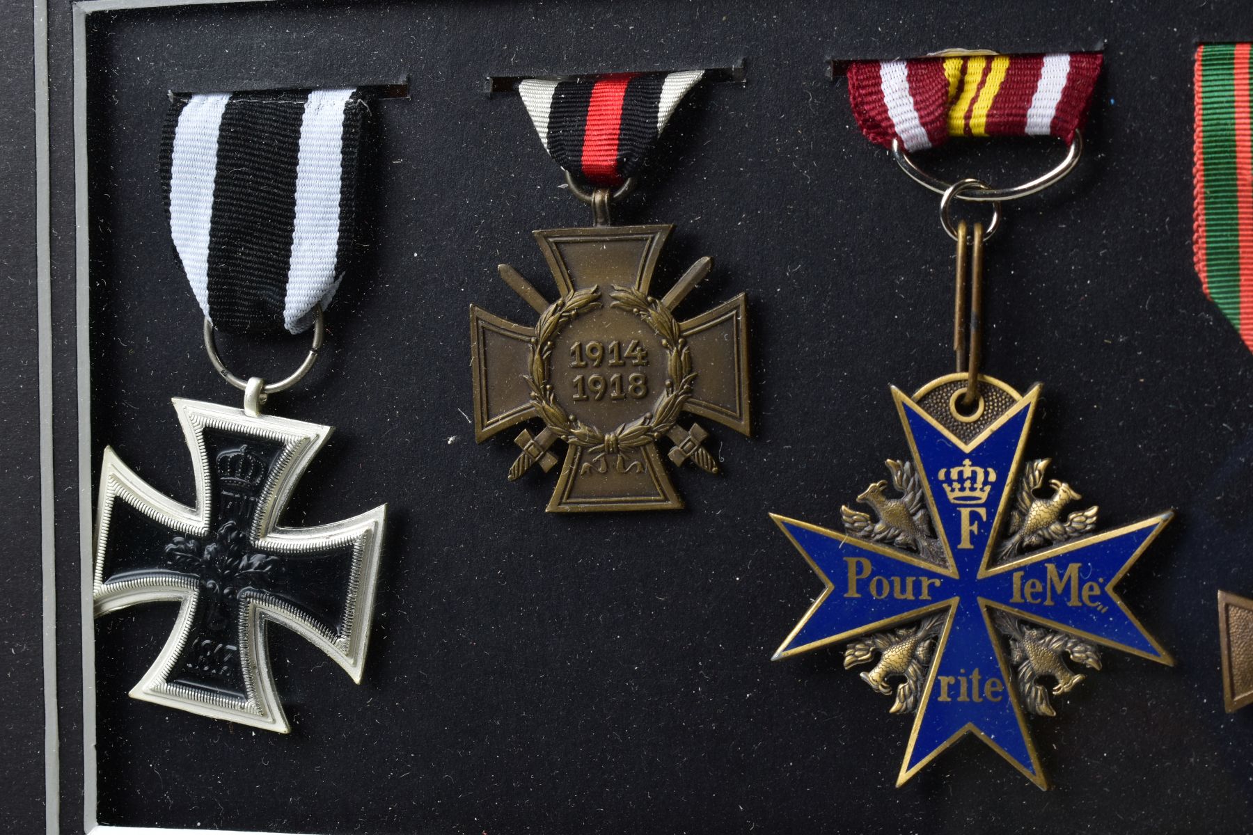 A GLAZED FRAME CONTAINING THE FOLLOWING MEDALS, WWI German Iron Cross (replica), German WWI - Image 2 of 3