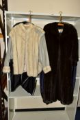 A LADIES GREY LEATHER AND WHITE FUR JACKET and a ladies long brown fur coat, both bear labels for