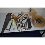 A BOX CONTAINING VARIOUS VINTAGE HAND TOOLS including saws, chisels, hand drill, etc