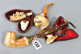 A GROUP OF FIVE MEERSCHAUM PIPES, two cased, comprising a 9ct gold mounted dog mask pipe (sd),