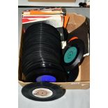 A TRAY CONTAINING OVER ONE HUNDRED AND TWENTY 7'' SINGLES including artists such as Elvis Presley,