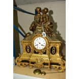 A LATE 19TH CENTURY FRENCH BRONZED AND GILT METAL MANTEL CLOCK, figural decoration of a young couple