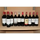 THIRTEEN BOTTLES OF BORDEAUX RED WINE AND ONE MINERVOIS, comprising seven bottles of Chateau Haut