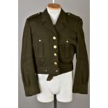 FIVE US ARMY SHORT, belted battledress jackets, WWII style, some with insignia, sleeve etc and medal