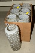 A SET OF SEVEN CYLINDRICAL OPAQUE WHITE GLASS LIGHT SHADES, moulded textured design, height 29cm x