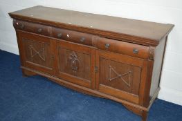 AN EARLY TO MID 20TH CENTURY OAK SIDEBOARD with three drawers and cupboard doors, width 184cm x