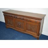 AN EARLY TO MID 20TH CENTURY OAK SIDEBOARD with three drawers and cupboard doors, width 184cm x