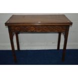 A GEORGE III MAHOGANY FOLD OVER CARD TABLE, green baize interior above a frieze and front legs