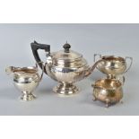 A GEORGE V SILVER THREE PIECE TEA SET, of panelled circular form, makers Gorham Manufacturing Co,