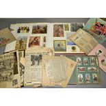 A COLLECTION OF EPHEMERA consisting of an early to mid 20th Century scrapbook containing newspaper