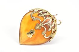 A LATE VICTORIAN BLONDE TORTOISESHELL PENDANT, the pear shape tortoiseshell pendant with applied