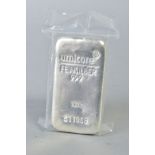 A UMICORE KILO INGOT OF SILVER, stamped 'FEINSILVER 999 1000g 511958' in a sealed bag, 32.29ozt,