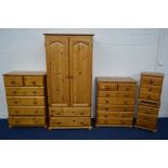 A MODERN PINE BEDROOM SUITE comprising a two door wardrobe with two drawers, width 86cm x depth 52cm