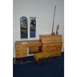 A MODERN PINE BUREAU with three drawers, a teak cased Singer treadle sewing machine, two mirrors,