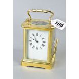 A 20TH CENTURY BRASS CASED CARRIAGE CLOCK, white dial, Roman numerals, marked ACC L to the back