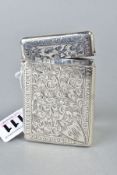 AN EDWARDIAN SILVER CARD CASE, rectangular outline, foliate engraved decoration back and front,