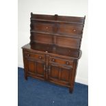 AN ERCOL DARK OAK DRESSER with seperate plate rack and two drawers, width 123cm x depth 46cm x