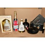 FOUR BOTTLES OF BLENDED WHISKY AND A BOTTLE OF CHAMPAGNE, comprising two Bell's Wade porcelain