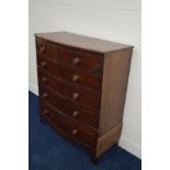 A GEORGIAN MAHOGANY BOW FRONT CHEST OF TWO SHORT AND FOUR LONG GRADUATING DRAWERS on bracket feet,