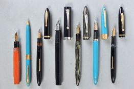 A BOXED WITH TAGS SHEAFFER VALIANT SNORKEL FOUNTAIN AND PENCIL SET in turquoise and gold trim, a