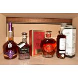 THREE BOTTLES OF COGNAC AND A BOTTLE OF WHISKEY, comprising a bottle of Courvoisier VS Cognac, 40%