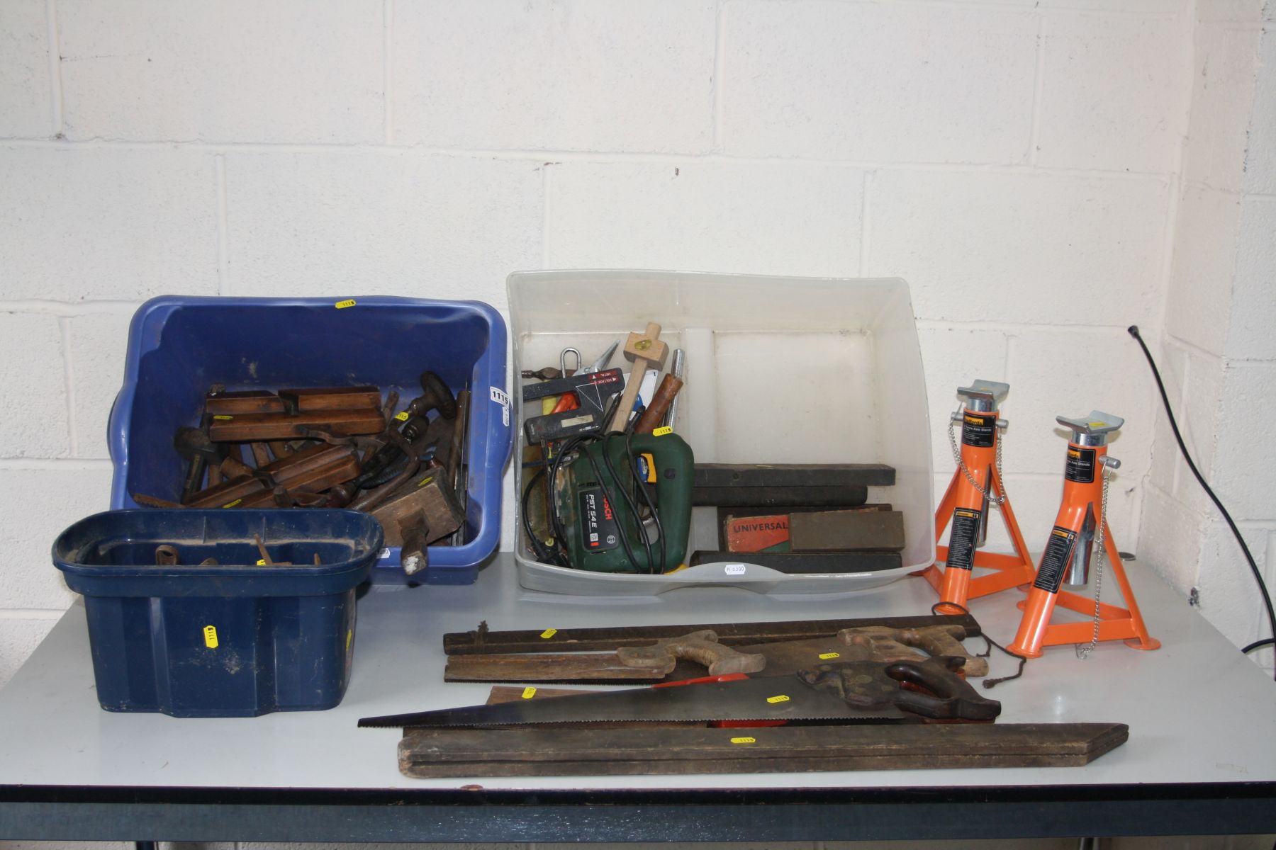 THREE BOXES OF VINTAGE AND MODERN TOOLS including wooden moulding planes, saws, axle stands, a Bosch