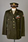 FIVE US ARMY DRESS JACKETS, with five sand coloured shirts and five green uniform caps, with US