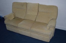 A BEIGE UPHOLSTERED THREE SEATER SETTEE, width 192cm