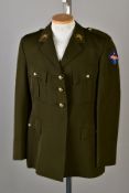 FIVE US ARMY DRESS JACKETS, with sleeve insignia, badges, medal ribbons etc, WWII era or later