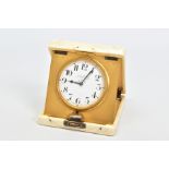 AN EARLY 20TH CENTURY IVORY CASED TRAVEL CLOCK, of square design with applied silver monogram to