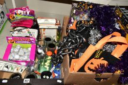 TWO BOXES OF HALLOWEEN THEMED ITEMS, including tinsel, face paint, candleholders, napkins,